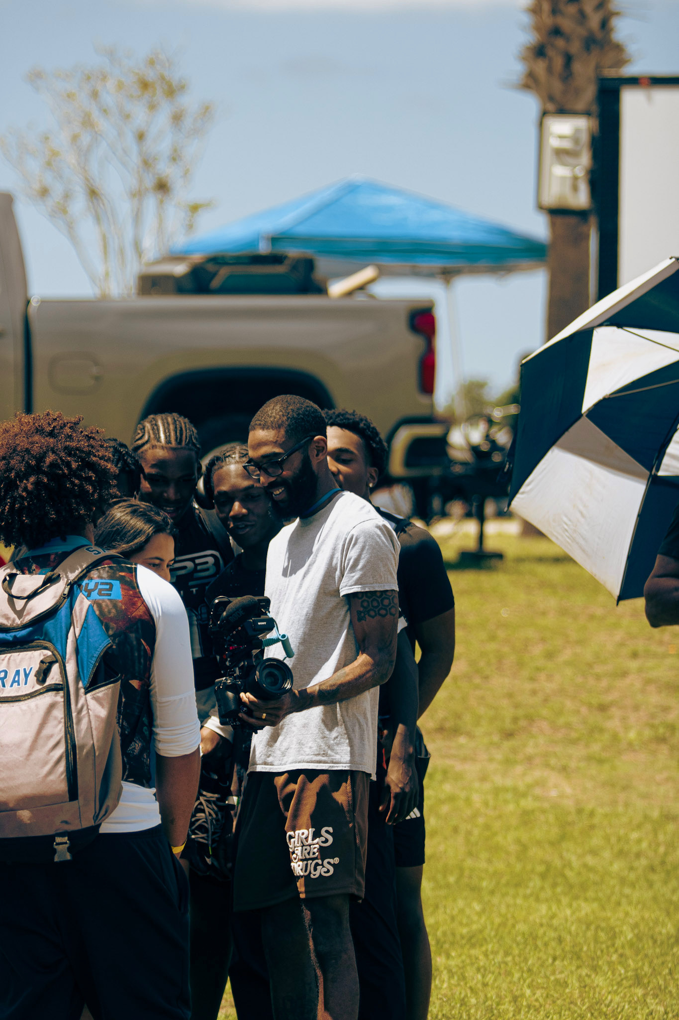 Stick sharing captured footage with a group of athletes